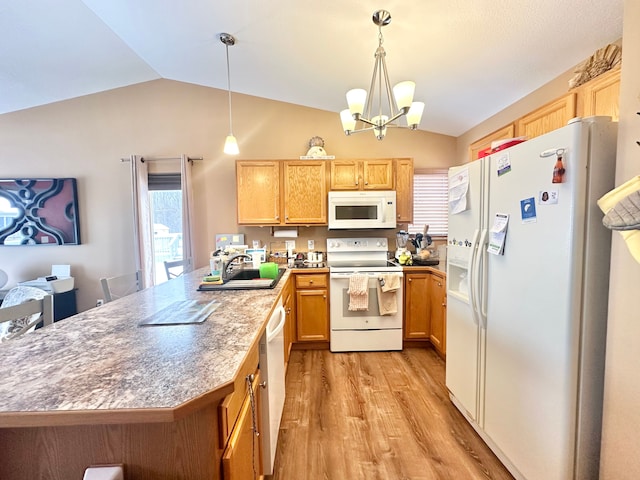 kitchen with a chandelier, white appliances, decorative light fixtures, and lofted ceiling