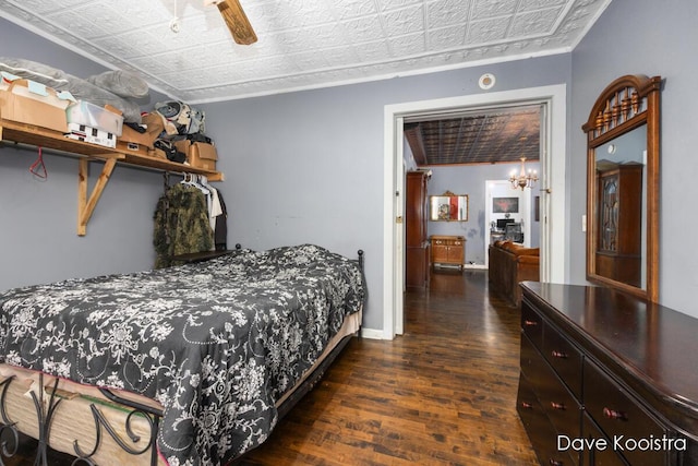 bedroom featuring ceiling fan and dark wood-type flooring