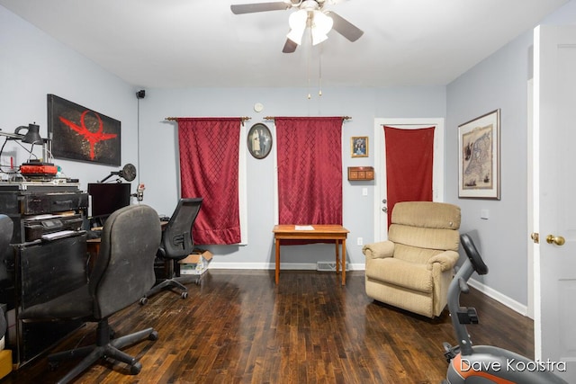 office with dark hardwood / wood-style flooring and ceiling fan