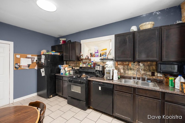 kitchen with sink, backsplash, black appliances, and dark brown cabinetry