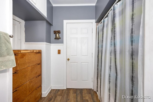 bathroom with hardwood / wood-style flooring