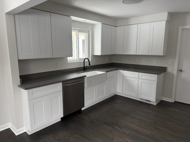 kitchen with dark hardwood / wood-style flooring, sink, white cabinetry, and black dishwasher