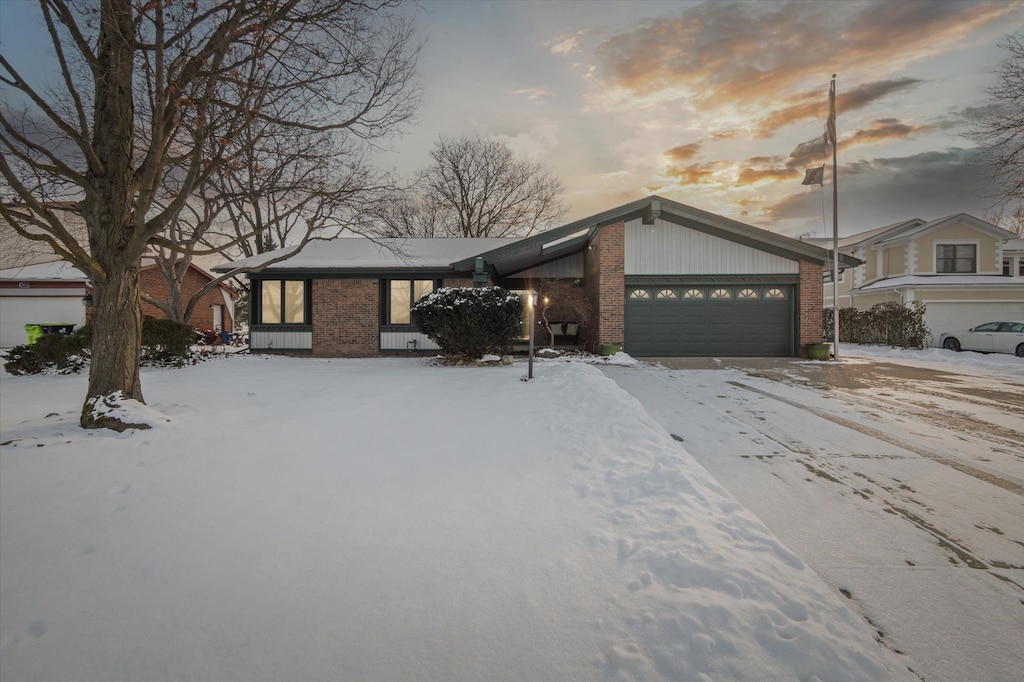 view of front of property with a garage