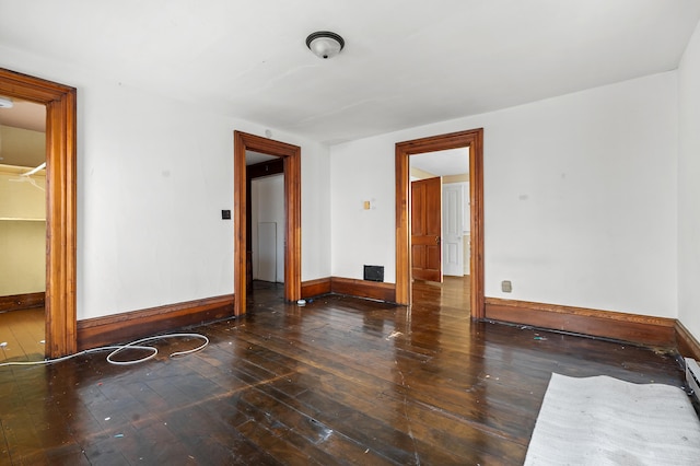 empty room featuring dark hardwood / wood-style floors