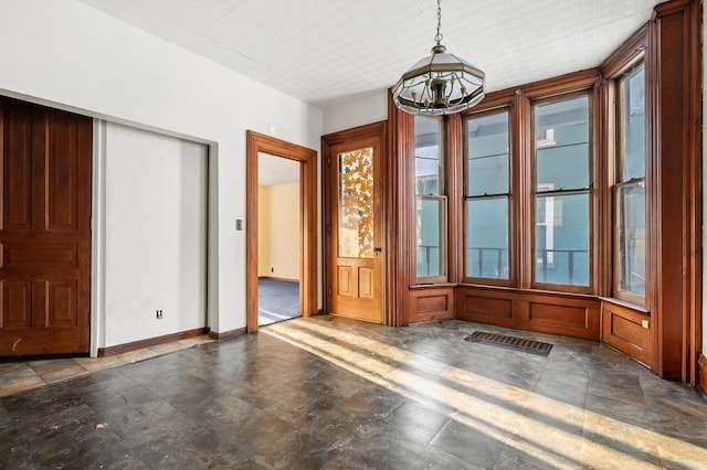 interior space with a notable chandelier