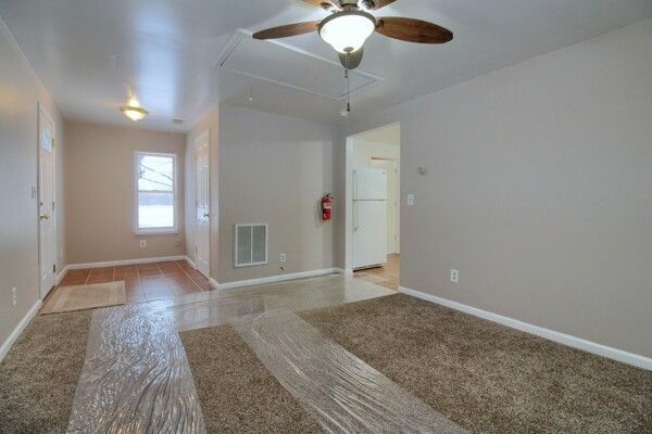 spare room with ceiling fan