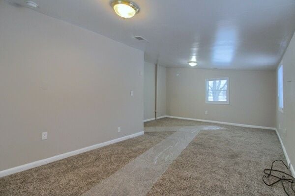 view of carpeted spare room