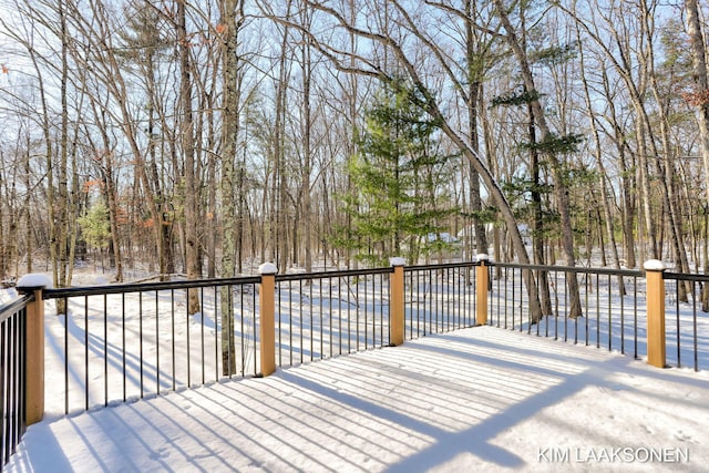 view of snow covered deck