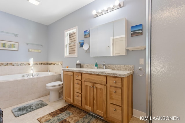 full bathroom with tile patterned flooring, vanity, separate shower and tub, and toilet