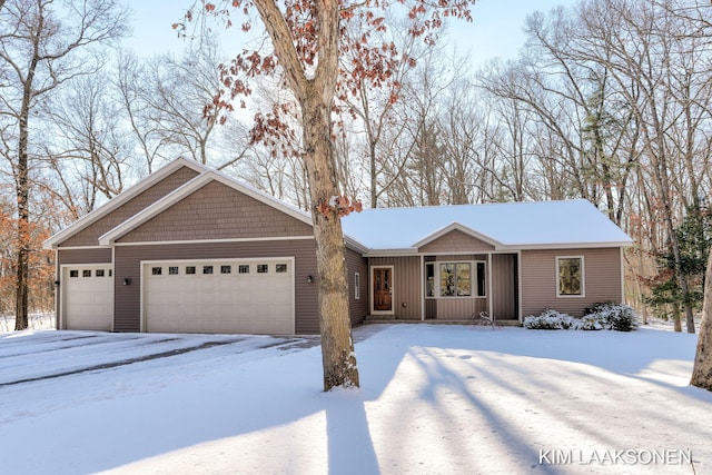 single story home featuring a garage