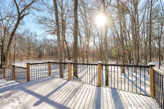 view of snow covered deck