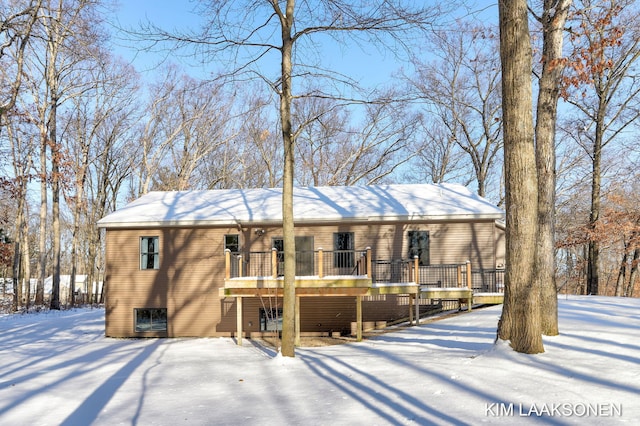 view of front of property with a wooden deck