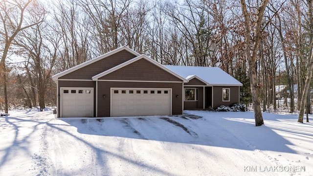 ranch-style home with a garage