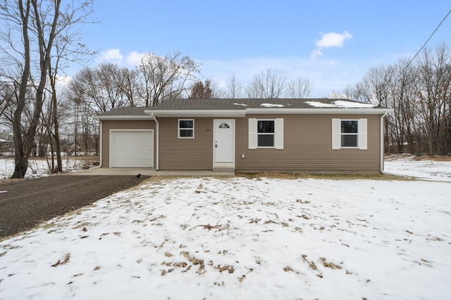 single story home featuring a garage