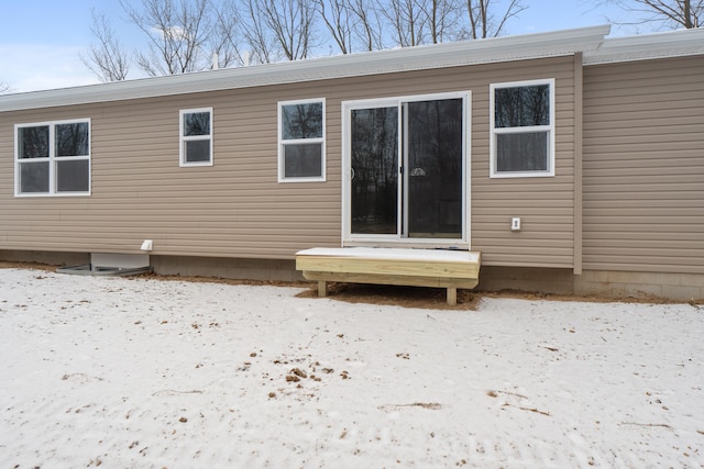 view of snow covered property