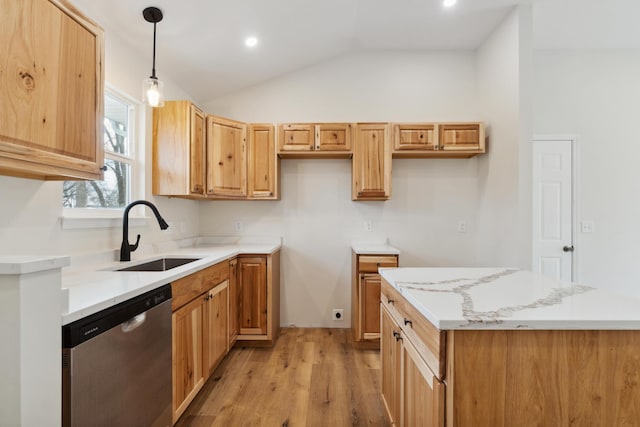 kitchen with lofted ceiling, stainless steel dishwasher, a sink, a kitchen island, and light wood-type flooring