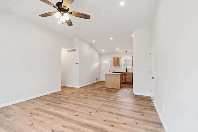 unfurnished living room with baseboards, visible vents, a ceiling fan, light wood-type flooring, and recessed lighting