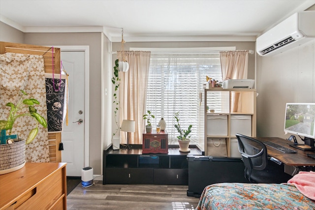 bedroom with multiple windows, dark hardwood / wood-style flooring, crown molding, and a wall mounted AC