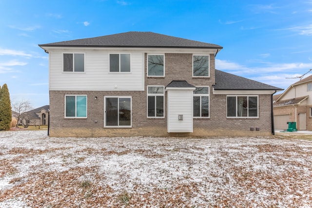 view of snow covered property