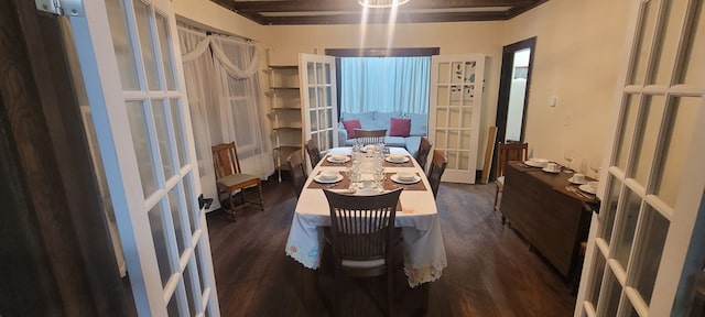 dining space featuring beamed ceiling, french doors, and dark hardwood / wood-style flooring