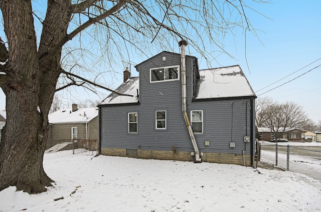 view of snow covered property