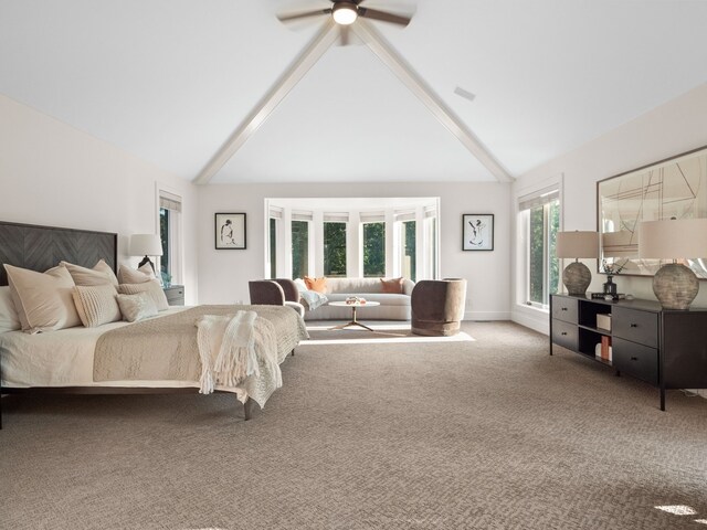 carpeted bedroom featuring high vaulted ceiling, beam ceiling, and ceiling fan