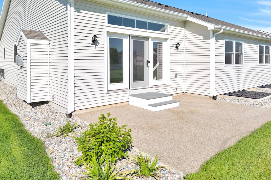 back of property featuring a patio area