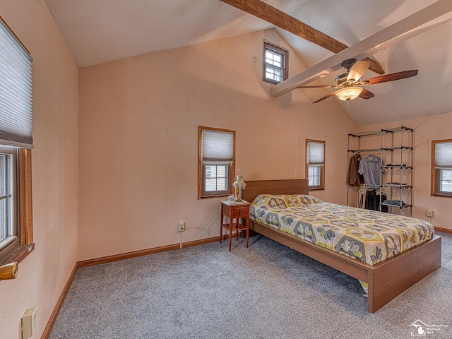 bedroom with lofted ceiling with beams, carpet floors, and ceiling fan