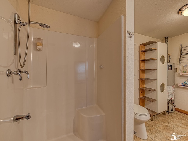 bathroom with a textured ceiling, a shower, gas water heater, and toilet