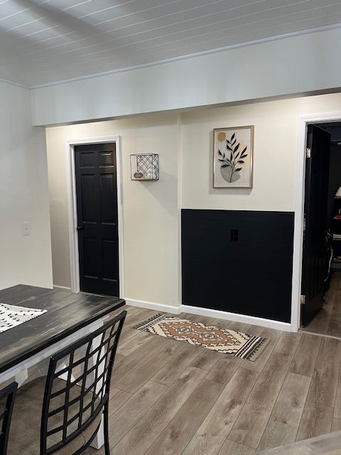 foyer entrance featuring wood ceiling