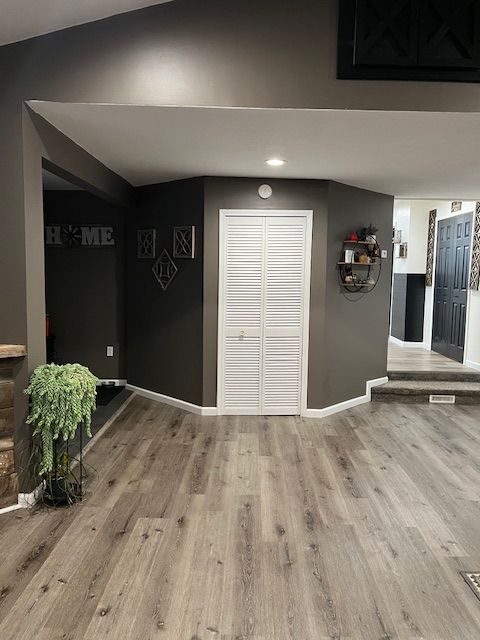 interior space with hardwood / wood-style flooring