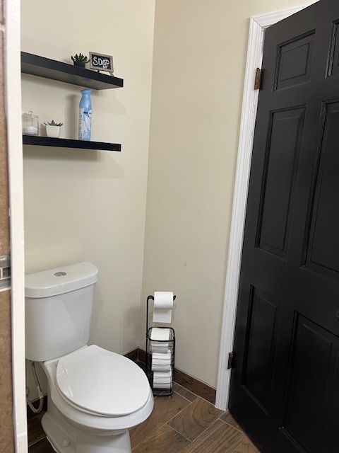 bathroom featuring toilet