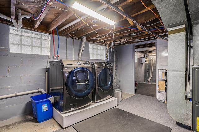 basement featuring washing machine and dryer