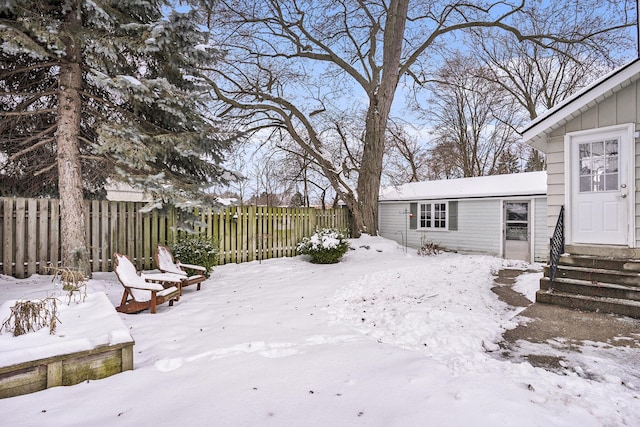 view of yard covered in snow