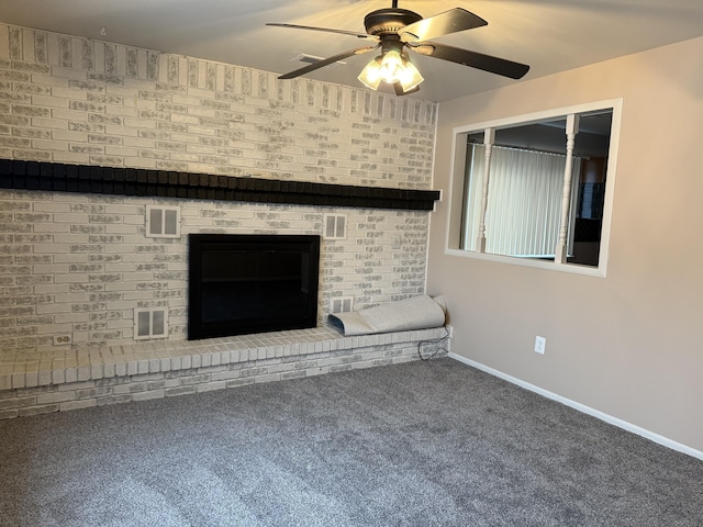 unfurnished living room featuring ceiling fan, carpet floors, and a fireplace