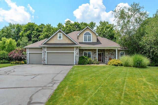 view of front facade with a front lawn and a garage