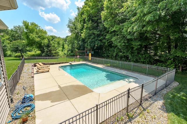 view of swimming pool featuring a patio area