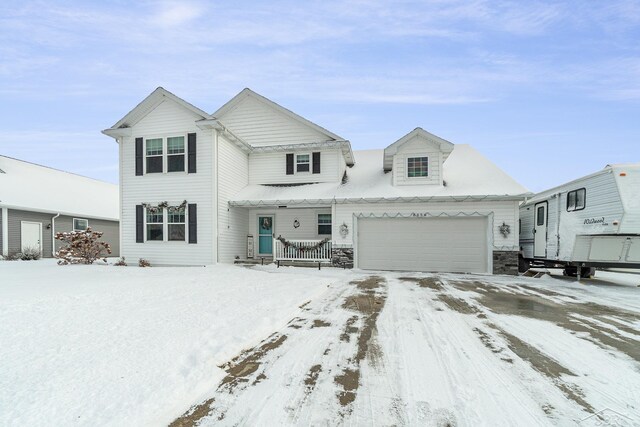 view of front of home with a garage