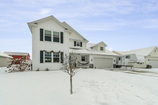 view of front of property with a garage