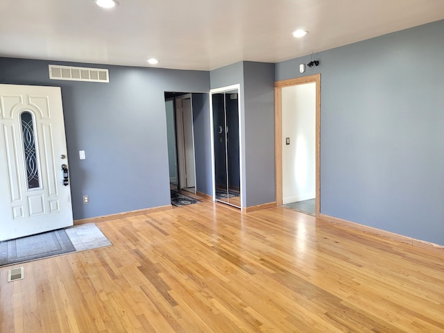 entrance foyer with light wood-type flooring