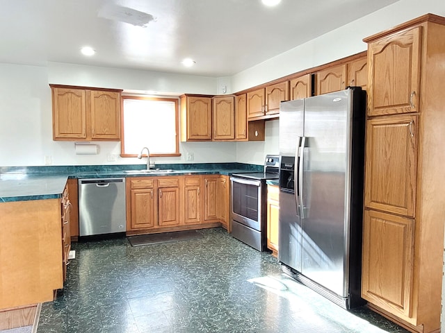 kitchen featuring stainless steel appliances and sink