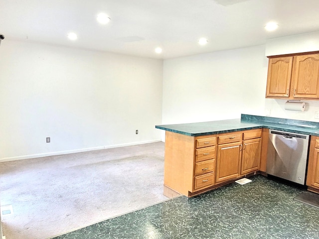 kitchen featuring dishwasher and kitchen peninsula