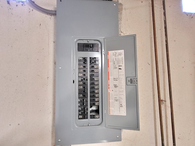 utility room featuring electric panel