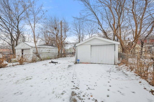 view of snow covered garage