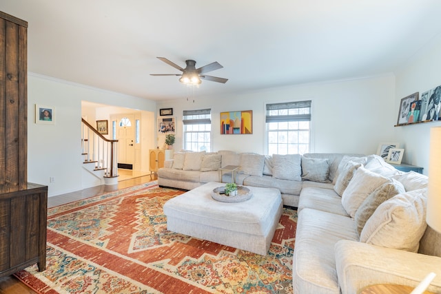 living room with ceiling fan and hardwood / wood-style floors