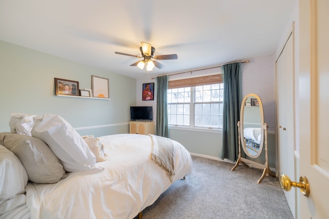 carpeted bedroom featuring ceiling fan