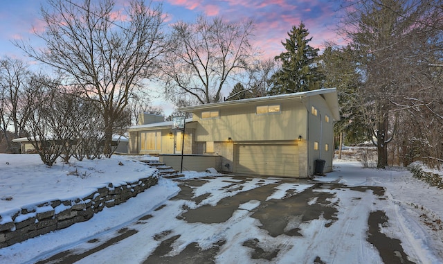 exterior space with a garage