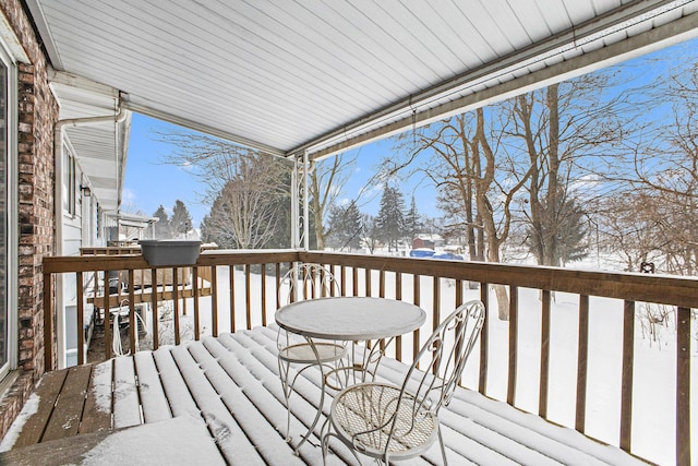 view of snow covered deck