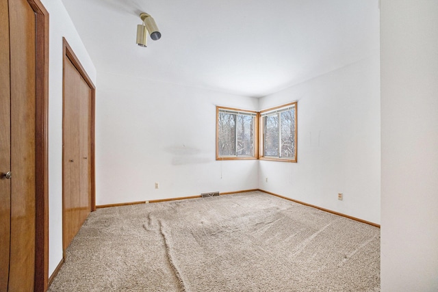 unfurnished bedroom featuring carpet floors