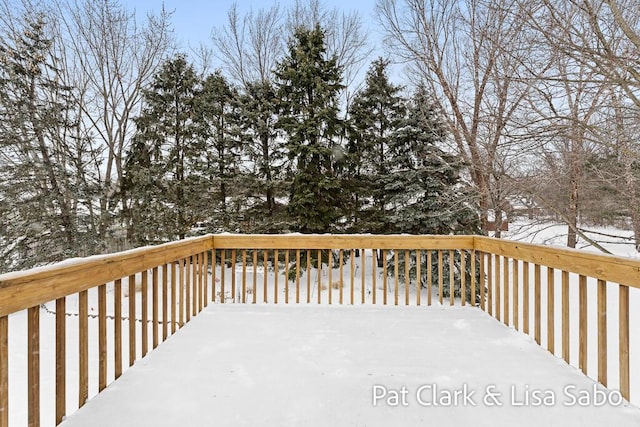 view of snow covered deck